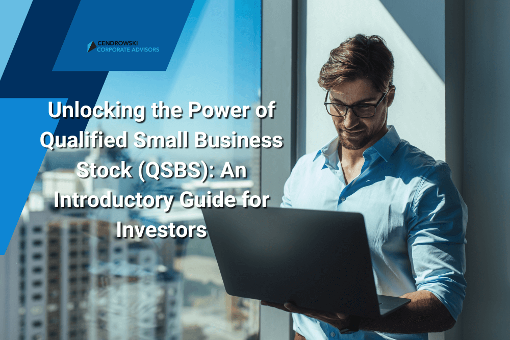 A man in an office holds a laptop and smiles, with city buildings visible through the window. Text overlay discusses how to unlock the power of qualified small business stock (QSBS) with this essential investor guide.